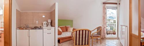 Dapur atau dapur kecil di Apartmani Putnik