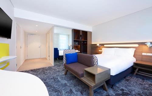 Voodi või voodid majutusasutuse Holiday Inn Express Sydney Macquarie Park by IHG toas