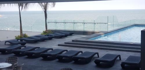 Bazén v ubytování Hotel Plaza Sol Veracruz nebo v jeho okolí