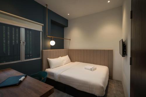 Masson Hotel Butterworthにあるベッド