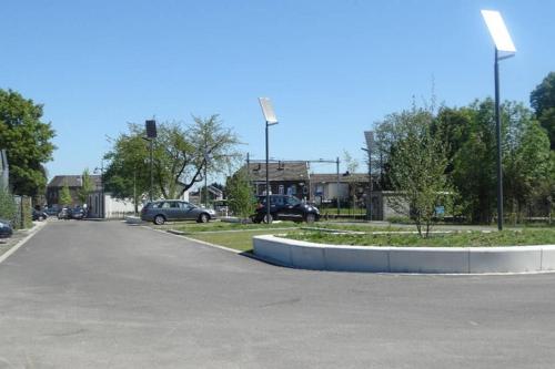 a parking lot with cars parked in a parking lot at Authentic Stays - 6p-maisonette in Eijsden