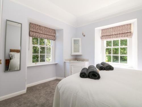 Llit o llits en una habitació de Culdrose Manor