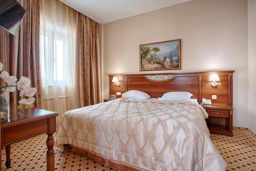 
Кровать или кровати в номере Отель Маркштадт
