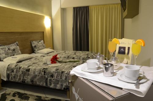 Posteľ alebo postele v izbe v ubytovaní Marie Palace