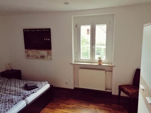 Postel nebo postele na pokoji v ubytování Ferienwohnung Südschwarzwald