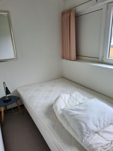 Postel nebo postele na pokoji v ubytování Stoholm Vandrehjem
