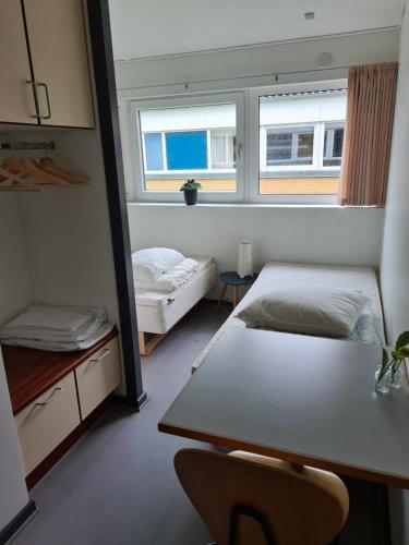 Postel nebo postele na pokoji v ubytování Stoholm Vandrehjem