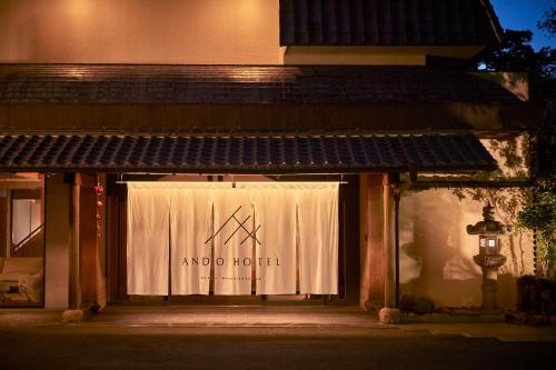 a store front with a window with the words avid hotel at ANDO HOTEL NARA Wakakusayama -DLIGHT LIFE & HOTELS- in Nara