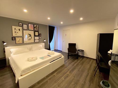 Katil atau katil-katil dalam bilik di Mimì Rooms&Studios