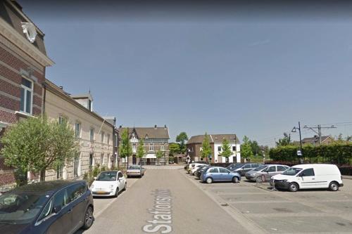 a street with cars parked on the side of the road at Authentic Stays - 6p-maisonette in Eijsden