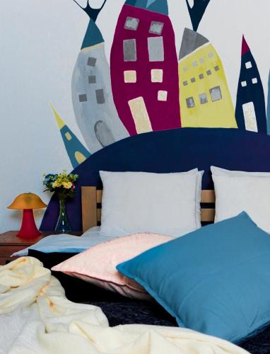 Ένα ή περισσότερα κρεβάτια σε δωμάτιο στο Villa K Apartments