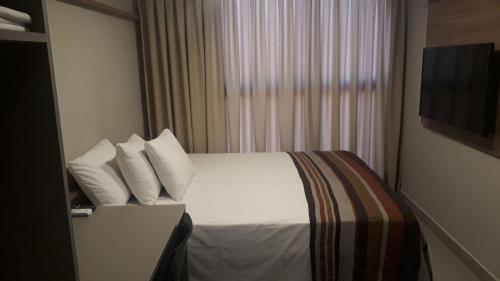 Cama o camas de una habitación en Uno flats. N. 107. Luxo