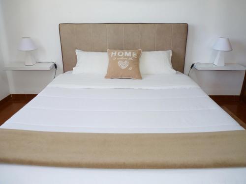 Katil atau katil-katil dalam bilik di Home for Travellers ll