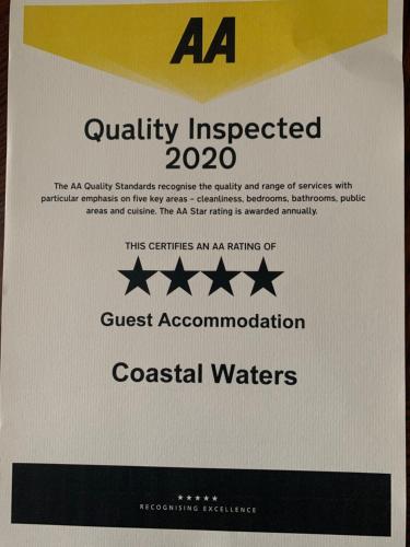 a sign that says quality inspected with a certifiablerequired sqor sqor sqor at Coastal Waters (Hotel Barton) in Torquay