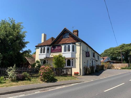 a white building on the side of a street at Kings Head Inn in Rye