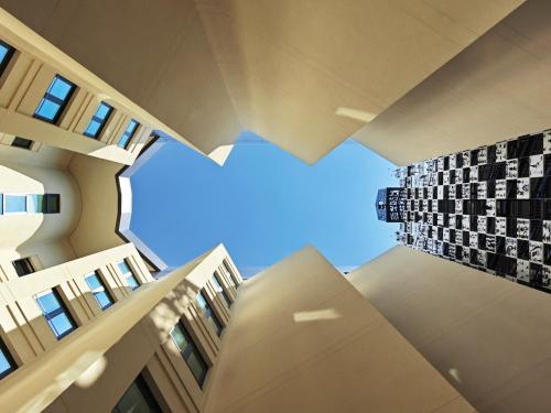 a view from inside a building looking up at the sky at Athens Capital Center Hotel - MGallery Collection in Athens