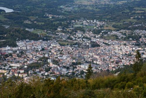 a view of a city from a mountain at PARENTHESE - Le Vignemale in Lourdes