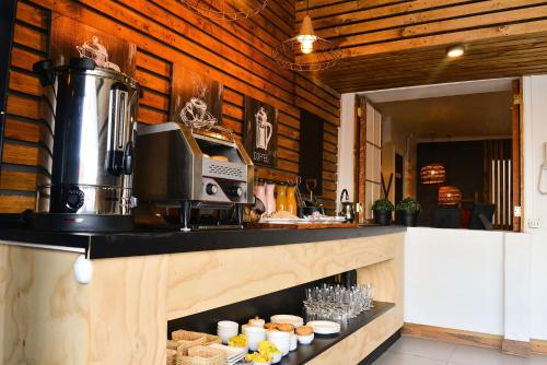 A kitchen or kitchenette at Etnico Bío Bío Hotel