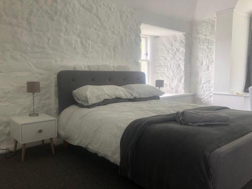 Ένα ή περισσότερα κρεβάτια σε δωμάτιο στο Hartfield House Hostel
