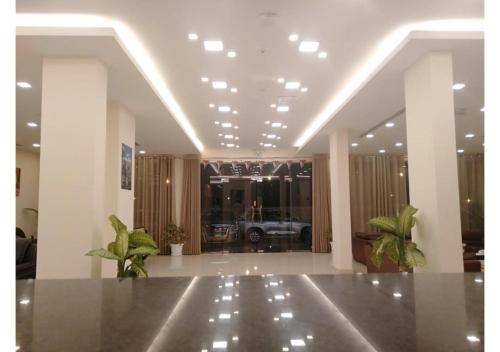 a lobby with a room with a car in it at Tanuf Residency Hotel in Nizwa