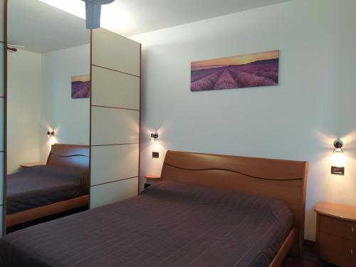 En eller flere senge i et værelse på Appartamento a Cadoneghe Storica