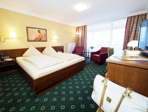 Cama o camas de una habitación en Hotel Olympia