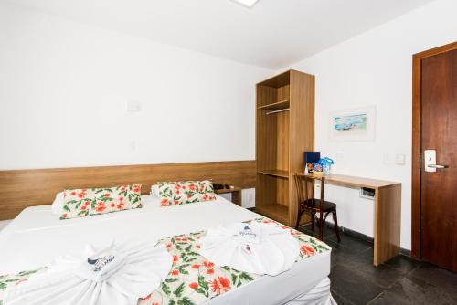 La Belle Beach Hotelにあるベッド
