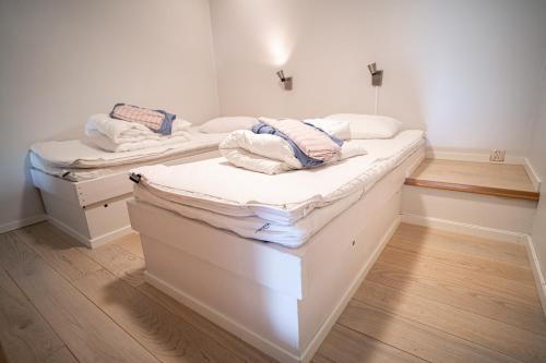 Un pat sau paturi într-o cameră la Maristova apartment 109