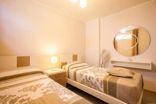 Posteľ alebo postele v izbe v ubytovaní 1 Bedroom Apartment for 4 people in Tenerife