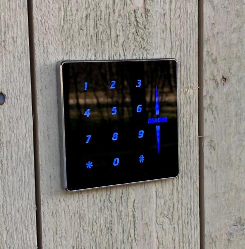 a close up of a remote control on a wall at Sea View Studio Apartments by the Beach in Ihasalu