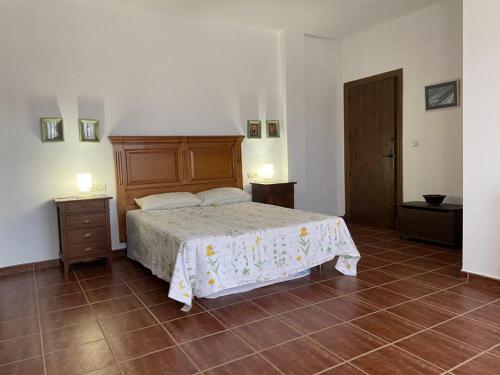 En eller flere senge i et værelse på Casa Rural Bellavista