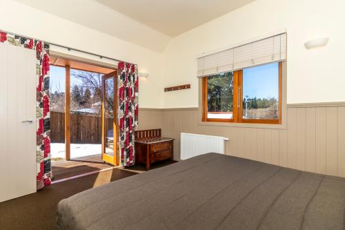 Postel nebo postele na pokoji v ubytování NASEBY lodge