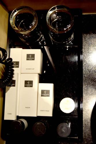a black table with someousandousandousandousandousandousandousandousandousandousandousand at Lazenda Hotel in Labuan