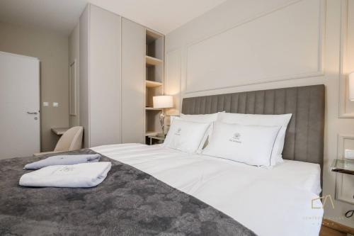 Postel nebo postele na pokoji v ubytování Luxury Villa MetraMaris1