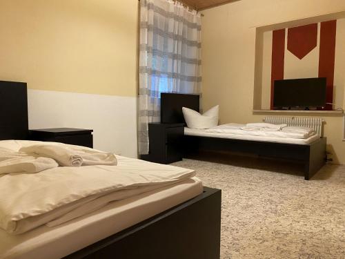 Postel nebo postele na pokoji v ubytování WA121 - Monteurwohnung in Wackersdorf