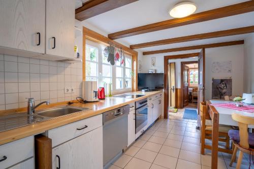 a kitchen with a sink and a counter top at Ortmanns Eulennest in Finnentrop