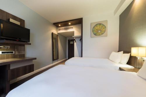 Ένα ή περισσότερα κρεβάτια σε δωμάτιο στο Holiday Inn Express Durban - Umhlanga by IHG