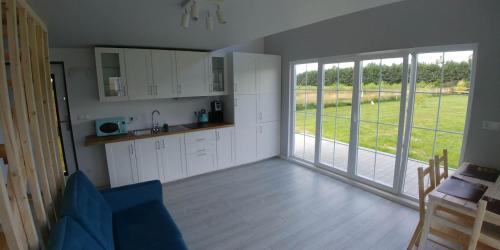Dapur atau dapur kecil di Dom z basenem nad rzeką PIlicą