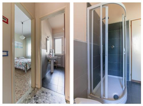 a bathroom with a shower and a bathroom with a toilet at Appartamento Marco Polo in Viareggio