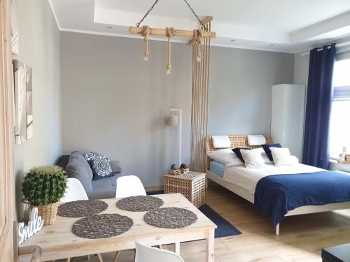 Posteľ alebo postele v izbe v ubytovaní JM Sopot Apartament Haffner