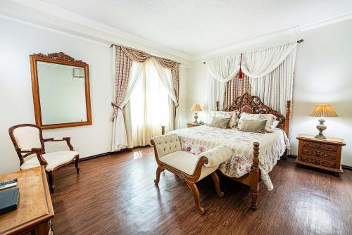 Säng eller sängar i ett rum på Hotel Euro Suite Campinas