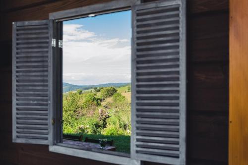 a window with a view of a mountain view at Sielska Chyża in Rzepedż