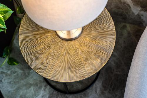 a close up of a table with a lamp at Toboso Apar - Turis in Nerja
