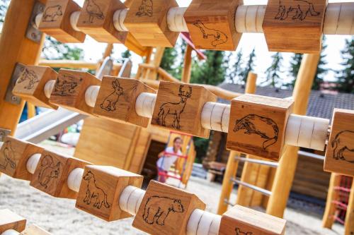 a bunch of wooden blocks with animals on them at Zruby Bystrá, Chopok Juh in Bystrá