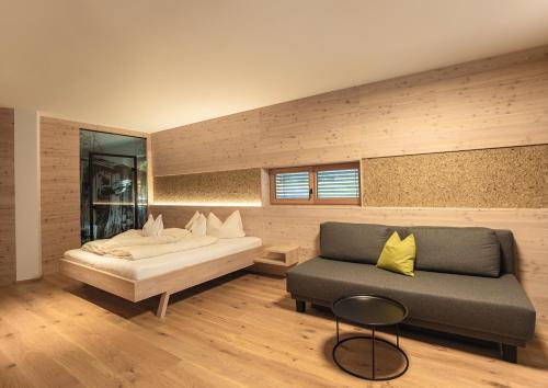 Ein Bett oder Betten in einem Zimmer der Unterkunft Hotel Weiler - Aktiv & Tradition