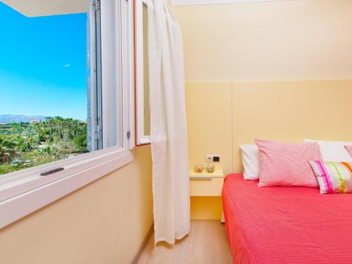 Posteľ alebo postele v izbe v ubytovaní Apartment Corales de Mar, at Alcudia Beach