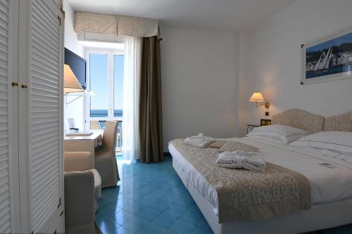 Кровать или кровати в номере Best Western Hotel Acqua Novella