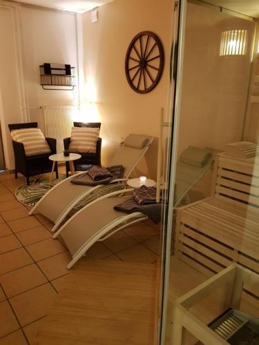 Χώρος καθιστικού στο Moderne Ferienwohnung auf dem Kastanienhof Oetzen