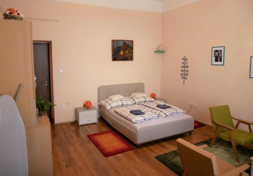 Postel nebo postele na pokoji v ubytování Gala Apartment