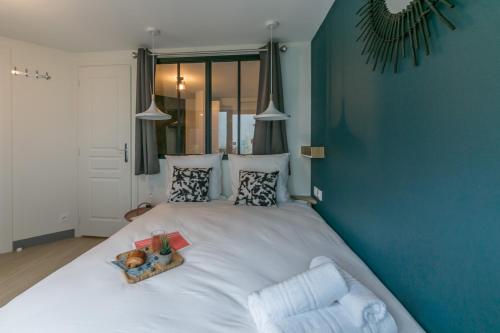 Ένα ή περισσότερα κρεβάτια σε δωμάτιο στο Apartments WS Tour Eiffel - Nicolo